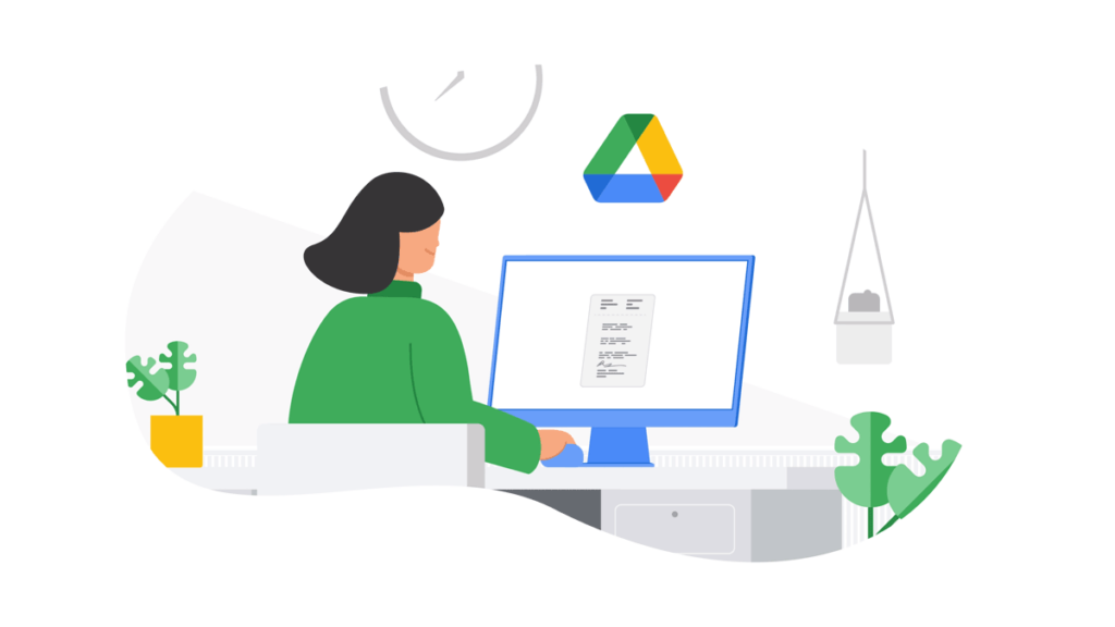una dona davant de l'ordinador mirant google drive